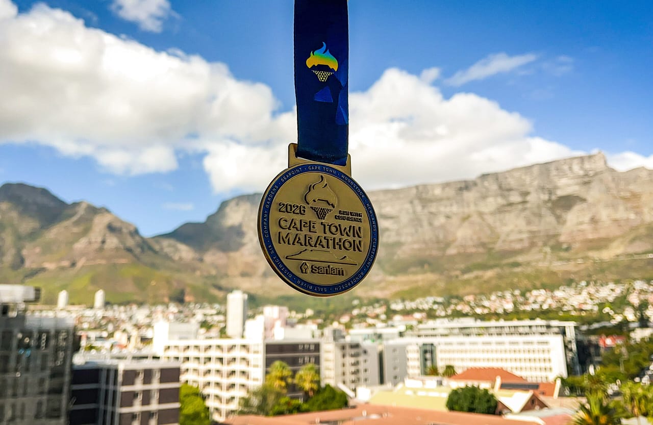 Featured image for “More Than a Medal – The Story Behind the 2026 Sanlam Cape Town Marathon Medal and New Logo”